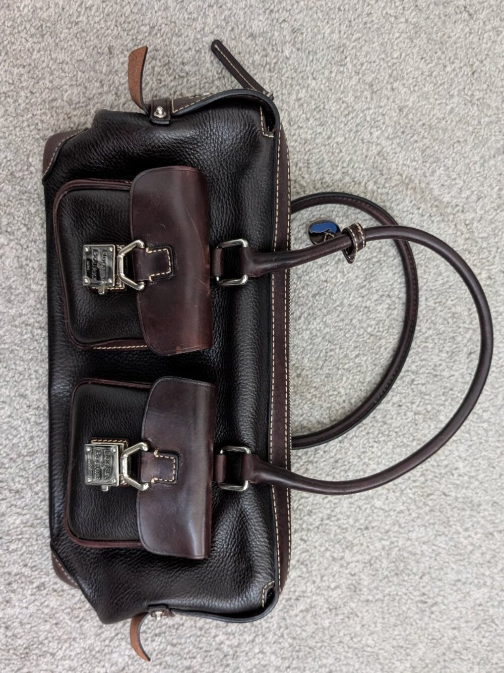 Dooney & Bourke Black Pebbled Satchel Top Handle Buckle Pockets Zip Charm